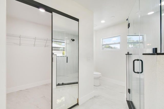 4873 SE Pilot Way, Stuart, FL 34997 - bathroom featuring marble finish floors, a stall shower, baseboards, and recessed lighting
