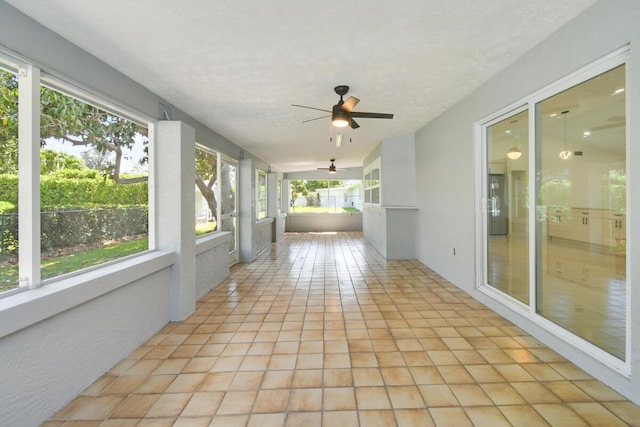 4873 SE Pilot Way, Stuart, FL 34997 - unfurnished sunroom featuring ceiling fan