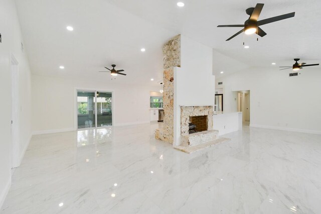 4873 SE Pilot Way, Stuart, FL 34997 - unfurnished living room with ceiling fan, light marble finish floors, recessed lighting, baseboards, and high vaulted ceiling