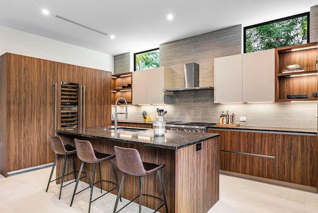 775 Park Dr W, Boca Raton, FL 33432 - kitchen featuring open shelves, a sink, wall chimney range hood, modern cabinets, and recessed lighting