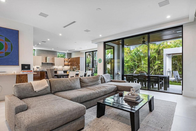 775 Park Dr W, Boca Raton, FL 33432 - living area with recessed lighting and light tile patterned floors
