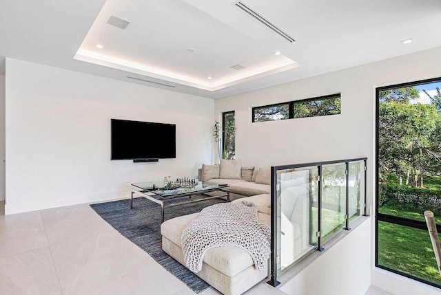 775 Park Dr W, Boca Raton, FL 33432 - living room with a raised ceiling and baseboards