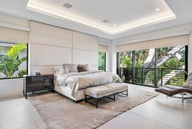 775 Park Dr W, Boca Raton, FL 33432 - bedroom with a raised ceiling, tile patterned floors, and recessed lighting
