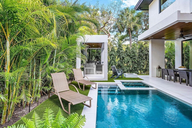 775 Park Dr W, Boca Raton, FL 33432 - view of pool with area for grilling, a ceiling fan, a pool with connected hot tub, and a patio area