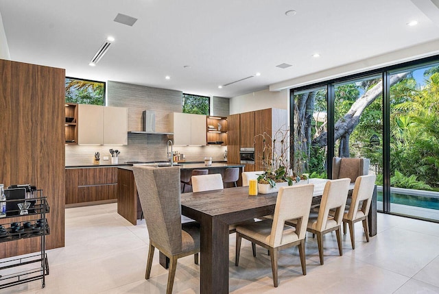 775 Park Dr W, Boca Raton, FL 33432 - dining room featuring light tile patterned floors