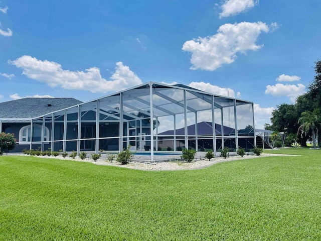 1036 Greenway Ter, Sebring, FL 33876 - back of house with a lawn and a lanai