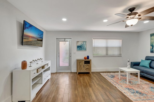 187 Seville H, Delray Beach, FL 33446 - living area featuring ceiling fan, baseboards, wood finished floors, and recessed lighting