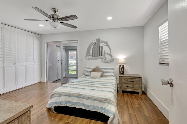 187 Seville H, Delray Beach, FL 33446 - bedroom with wood finished floors, baseboards, access to outside, recessed lighting, and a ceiling fan