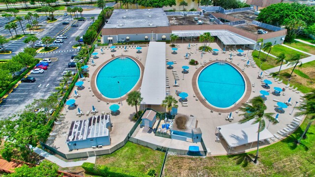 187 Seville H, Delray Beach, FL 33446 - aerial view of property and surrounding area featuring a pool area