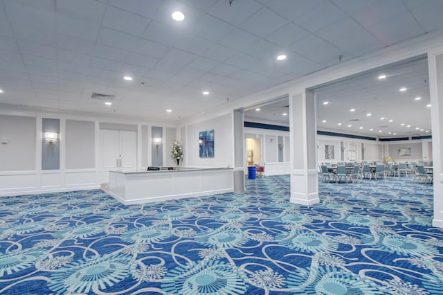 187 Seville H, Delray Beach, FL 33446 - community lobby with a decorative wall, recessed lighting, and ornamental molding