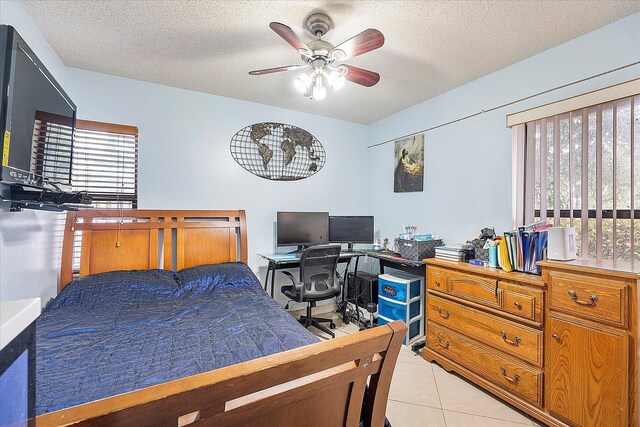 2326 NW 96th Way, Coral Springs, FL 33065 - bedroom featuring a desk, a textured ceiling, and light tile patterned floors