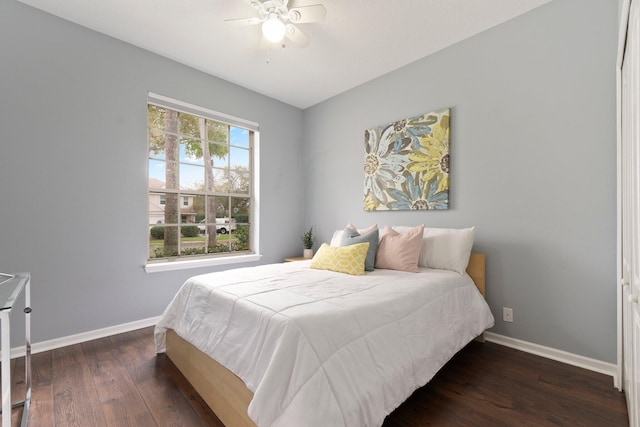 3288 SW Majestic Ct, Palm City, FL 34990 - bedroom featuring baseboards, wood finished floors, and a ceiling fan