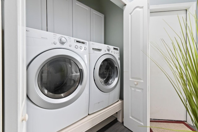 3288 SW Majestic Ct, Palm City, FL 34990 - laundry room featuring cabinet space and independent washer and dryer