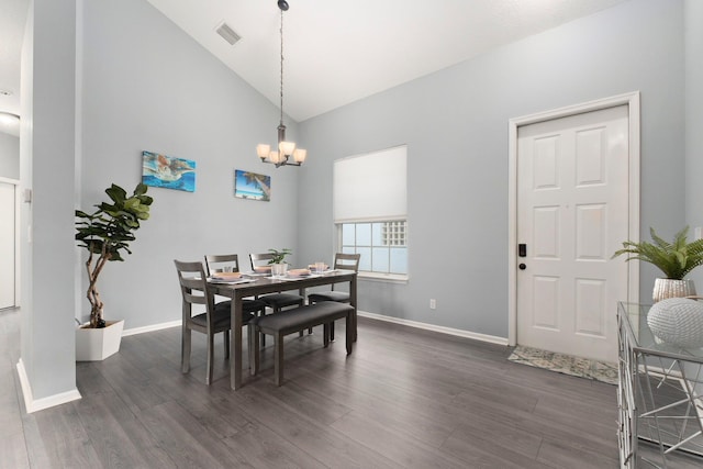 3288 SW Majestic Ct, Palm City, FL 34990 - dining space with high vaulted ceiling, baseboards, a chandelier, and dark wood-style flooring
