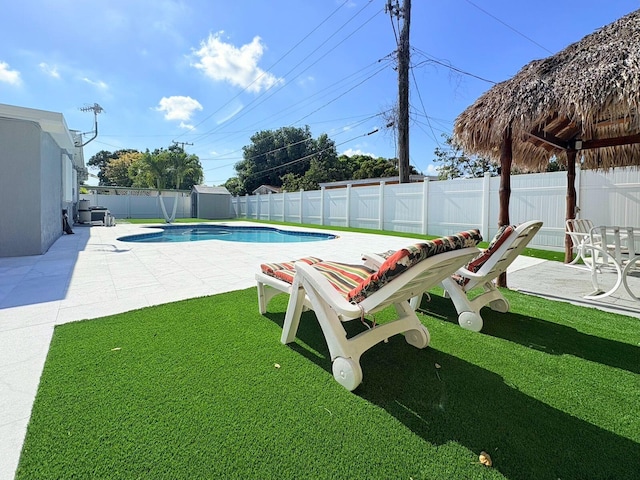 1034 Almeria Rd, West Palm Beach, FL 33405 - view of swimming pool featuring a patio area