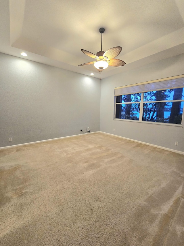 5704 Spanish River Rd, Fort Pierce, FL 34951 - empty room featuring carpet floors, a ceiling fan, baseboards, and recessed lighting