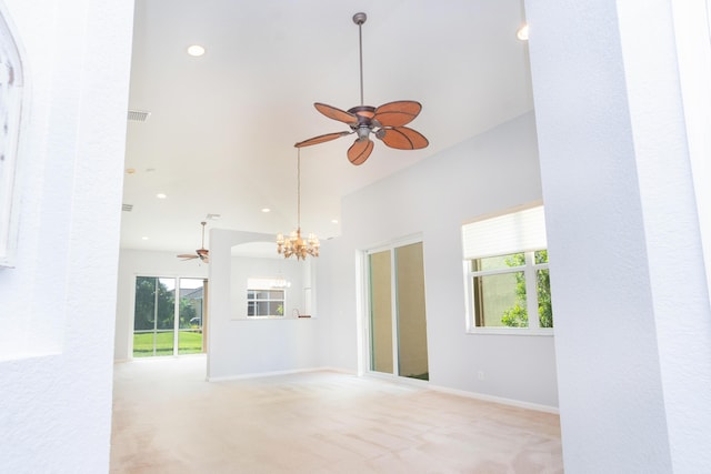 5704 Spanish River Rd, Fort Pierce, FL 34951 - empty room featuring a ceiling fan, light colored carpet, a chandelier, recessed lighting, and baseboards
