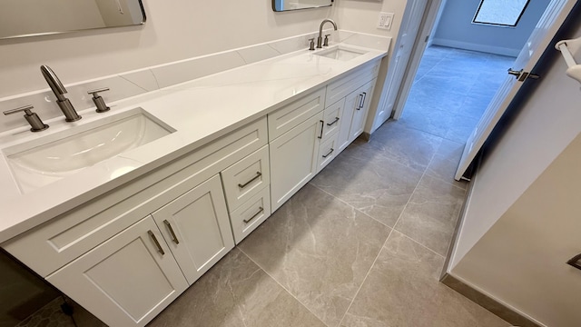 5800 Coach House Cir Unit B, Boca Raton, FL 33486 - bathroom featuring double vanity and tile patterned flooring