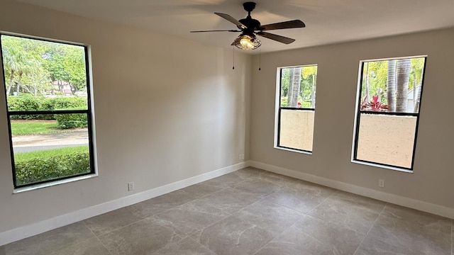 5800 Coach House Cir Unit B, Boca Raton, FL 33486 - unfurnished room with baseboards and a ceiling fan