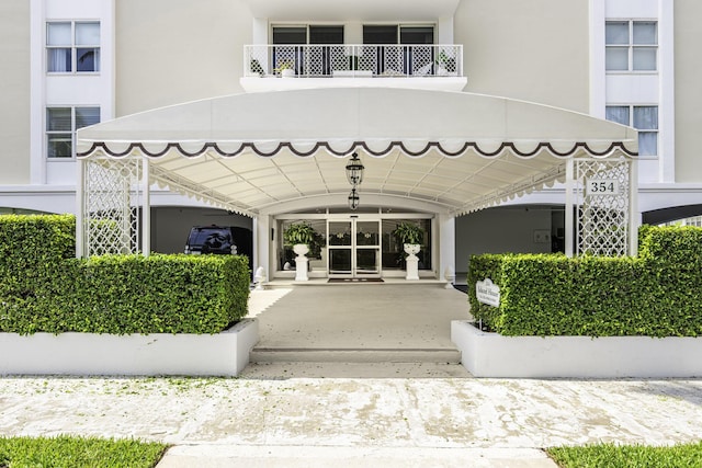 354 Chilean Ave Unit 3E, Palm Beach, FL 33480 - view of exterior entry featuring stucco siding