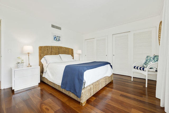 354 Chilean Ave Unit 3E, Palm Beach, FL 33480 - bedroom featuring multiple closets and wood finished floors