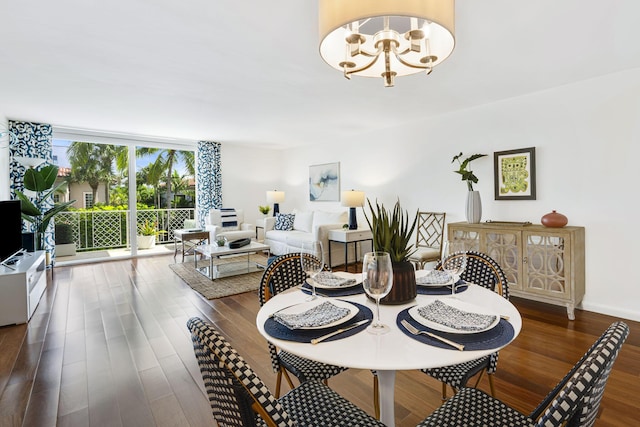 354 Chilean Ave Unit 3E, Palm Beach, FL 33480 - dining room with a chandelier and wood finished floors
