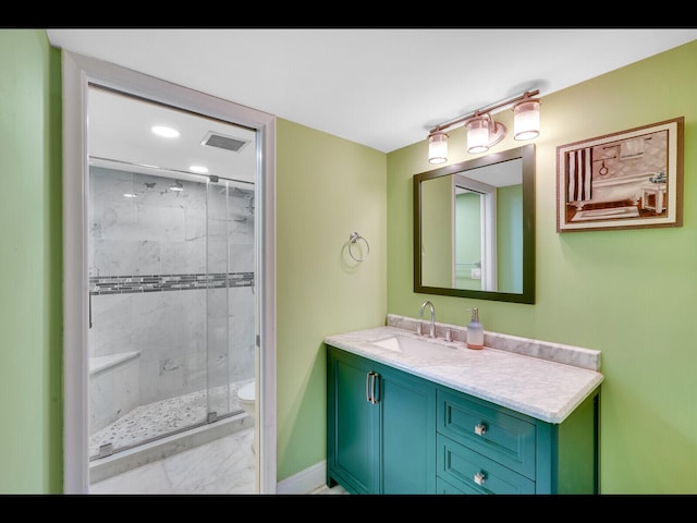 2400 Presidential Way Unit 401, West Palm Beach, FL 33401 - bathroom with a marble finish shower, toilet, vanity, baseboards, and marble finish floors