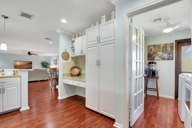 438 Pine Villa Dr, Atlantis, FL 33462 - kitchen featuring ceiling fan, washing machine and clothes dryer, open floor plan, decorative backsplash, and recessed lighting