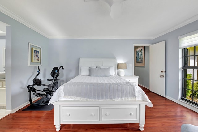 438 Pine Villa Dr, Atlantis, FL 33462 - bedroom with ornamental molding, dark wood-style floors, and baseboards