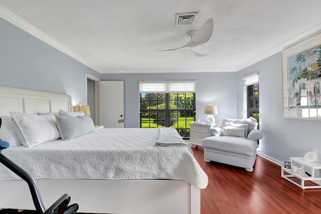 438 Pine Villa Dr, Atlantis, FL 33462 - bedroom with crown molding, wood finished floors, and ceiling fan