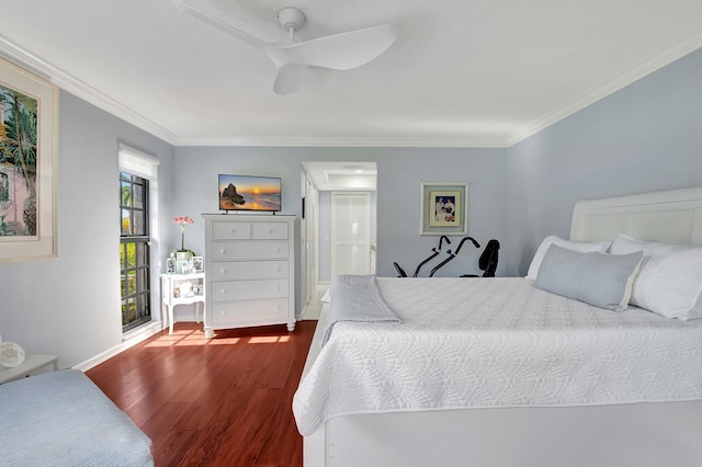 438 Pine Villa Dr, Atlantis, FL 33462 - bedroom featuring wood finished floors, crown molding, a ceiling fan, and ensuite bath
