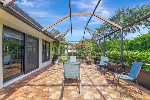 438 Pine Villa Dr, Atlantis, FL 33462 - view of patio with a lanai