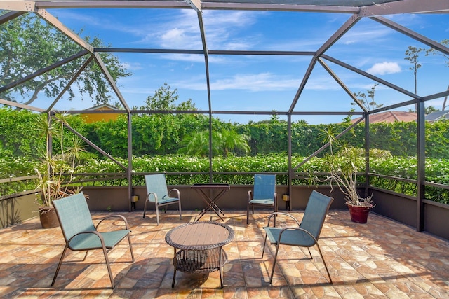 438 Pine Villa Dr, Atlantis, FL 33462 - view of patio / terrace featuring glass enclosure