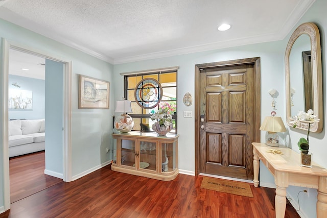438 Pine Villa Dr, Atlantis, FL 33462 - foyer with wood finished floors, crown molding, and baseboards