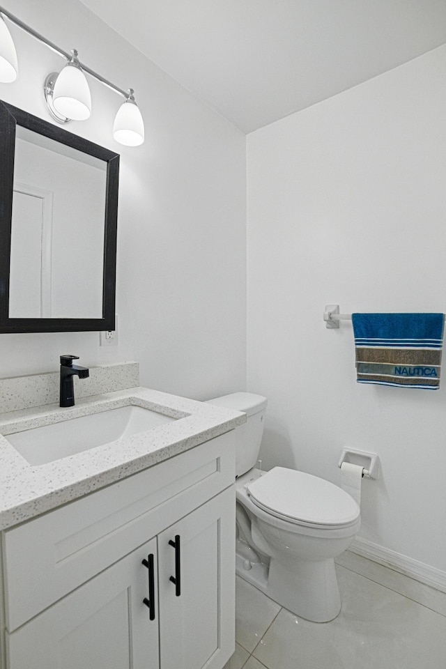 5242 Privet Pl Unit C, Delray Beach, FL 33484 - half bathroom featuring vanity, toilet, marble finish floors, and baseboards