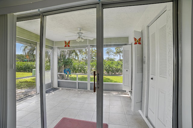 5242 Privet Pl Unit C, Delray Beach, FL 33484 - unfurnished sunroom with a ceiling fan and plenty of natural light