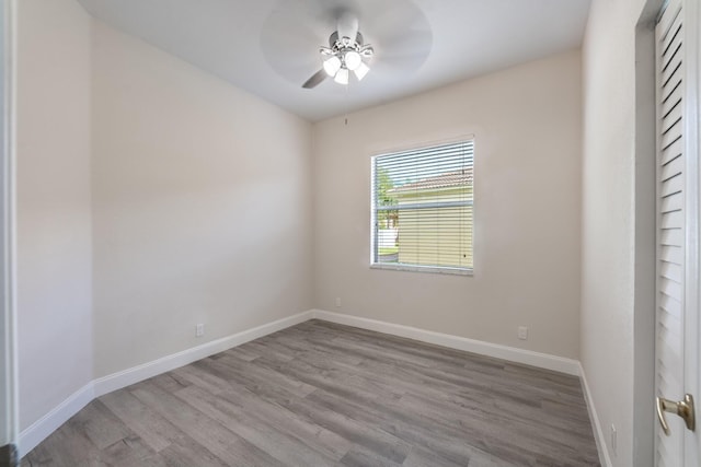 5761 Spanish River Rd, Fort Pierce, FL 34951 - unfurnished room featuring ceiling fan, wood finished floors, and baseboards
