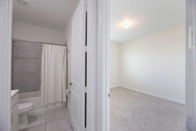 7499 NW Deysbrook Ln, Port Saint Lucie, FL 34987 - full bath with toilet, shower / bath combination with curtain, vanity, and baseboards