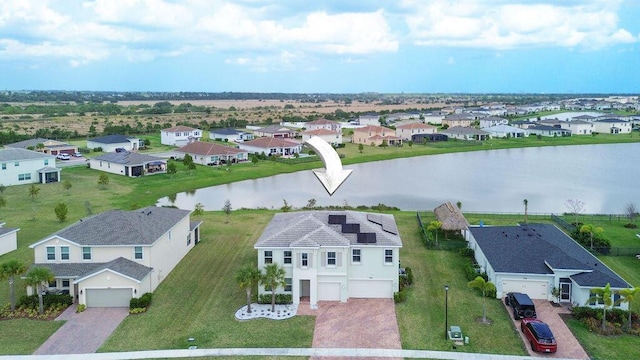 7499 NW Deysbrook Ln, Port Saint Lucie, FL 34987 - aerial view of residential area featuring a nearby body of water