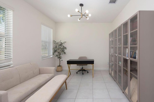 7499 NW Deysbrook Ln, Port Saint Lucie, FL 34987 - office area featuring a chandelier, light tile patterned floors, and baseboards