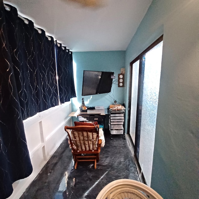 54 Piedmont Unit B, Delray Beach, FL 33484 - living area with concrete flooring