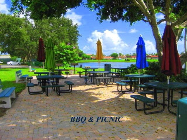 54 Piedmont Unit B, Delray Beach, FL 33484 - view of community with outdoor dining area