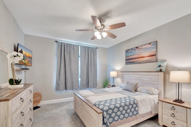 804 E Windward Way Unit 404, Lantana, FL 33462 - bedroom with light carpet, baseboards, and a ceiling fan