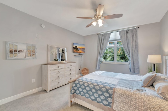 804 E Windward Way Unit 404, Lantana, FL 33462 - bedroom featuring baseboards, light carpet, and a ceiling fan