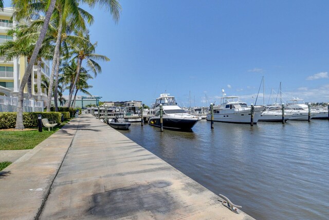 804 E Windward Way Unit 404, Lantana, FL 33462 - dock area featuring a water view