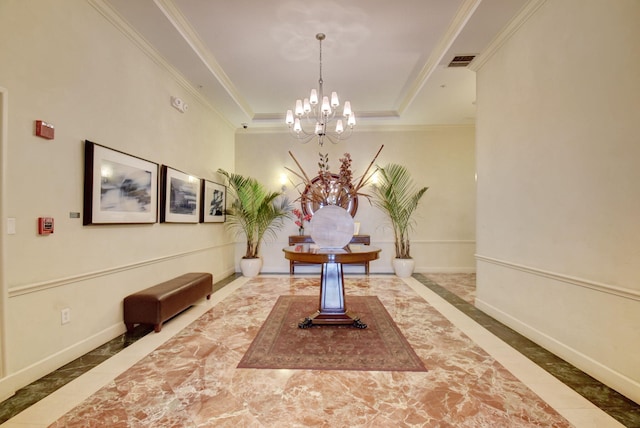 804 E Windward Way Unit 404, Lantana, FL 33462 - dining room with inlaid floor details, a chandelier, a raised ceiling, baseboards, and ornamental molding