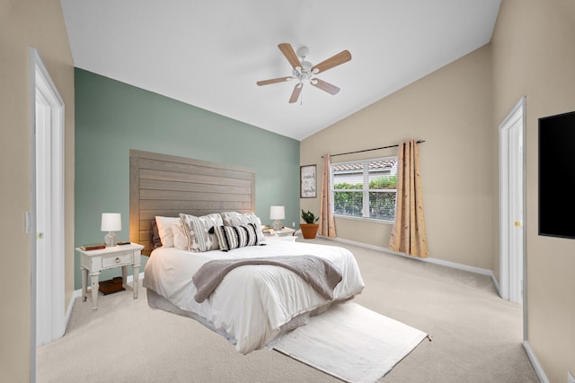 415 NW Granville St, Port Saint Lucie, FL 34986 - carpeted bedroom with lofted ceiling, baseboards, and ceiling fan