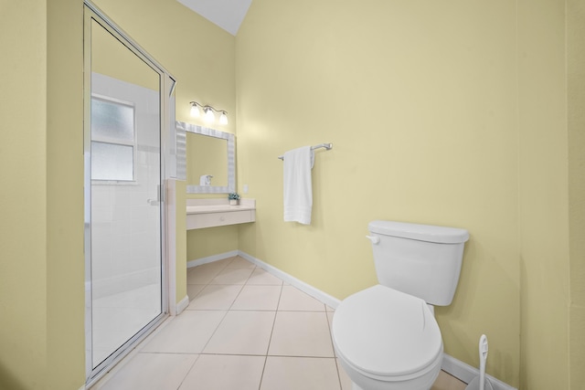 415 NW Granville St, Port Saint Lucie, FL 34986 - full bath with toilet, a shower stall, tile patterned floors, and baseboards