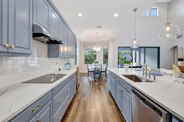 8271 Canopy Ter, Parkland, FL 33076 - kitchen with dishwasher, a sink, under cabinet range hood, black electric stovetop, and dark wood-type flooring