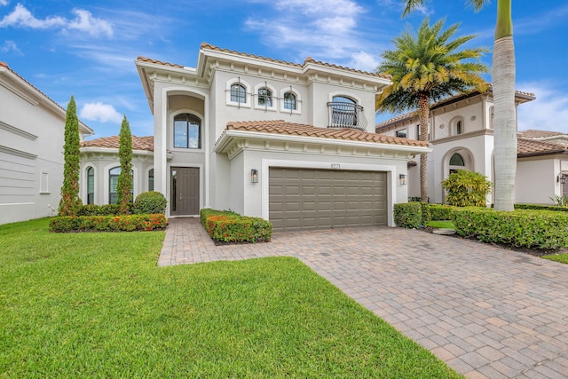 8271 Canopy Ter, Parkland, FL 33076 - mediterranean / spanish-style house with driveway, stucco siding, a tile roof, and a front lawn